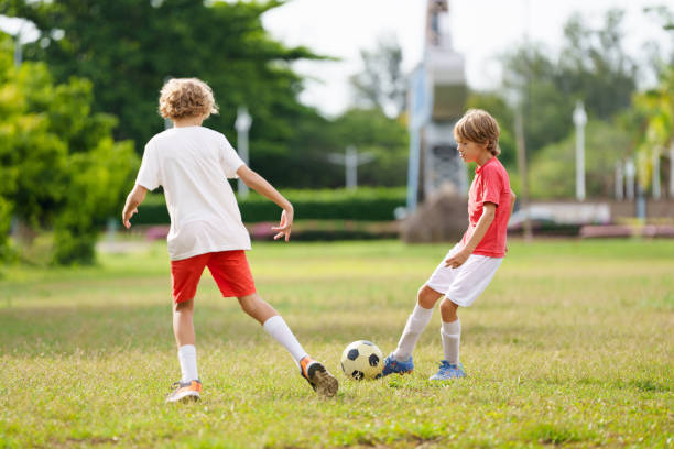 Two young players on the field